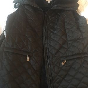 Brand new Black short vest jacket with faux fur.